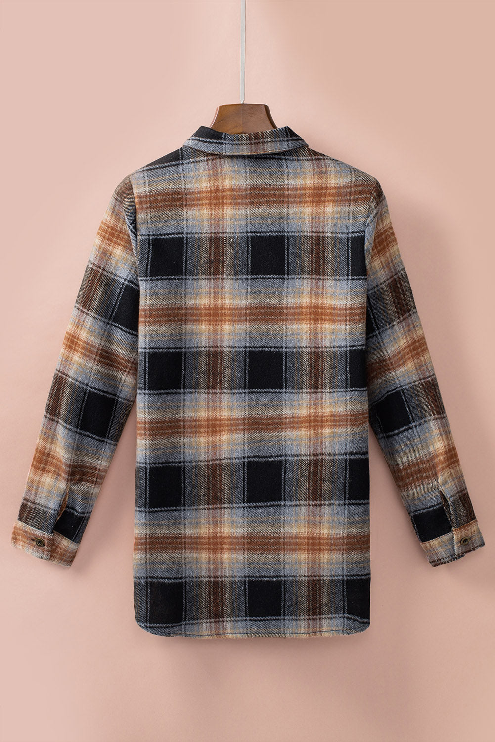 Gray oversize plaid shacket with rounded hem and slits, showcasing a stylish and comfortable design suitable for various outfits.