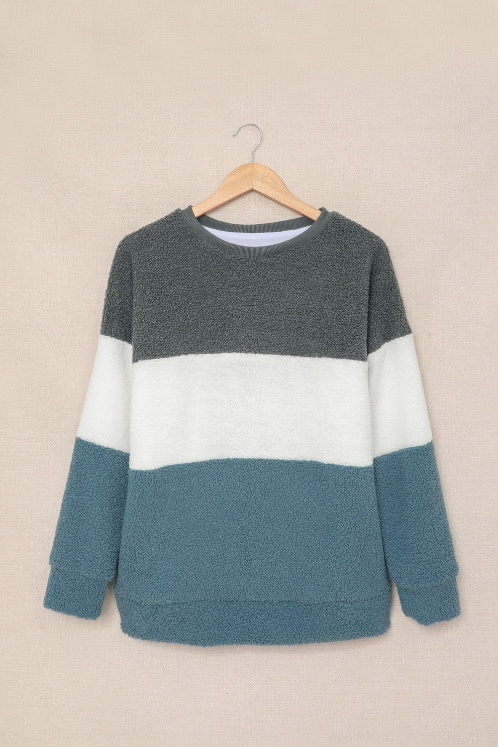 Gray oversized colorblock plush sweatshirt featuring a cozy design and trendy color combinations, perfect for casual wear.