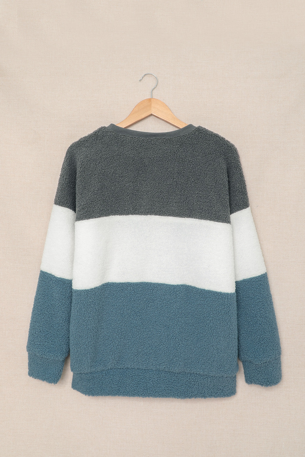 Gray oversized colorblock plush sweatshirt featuring a cozy design and trendy color combinations, perfect for casual wear.