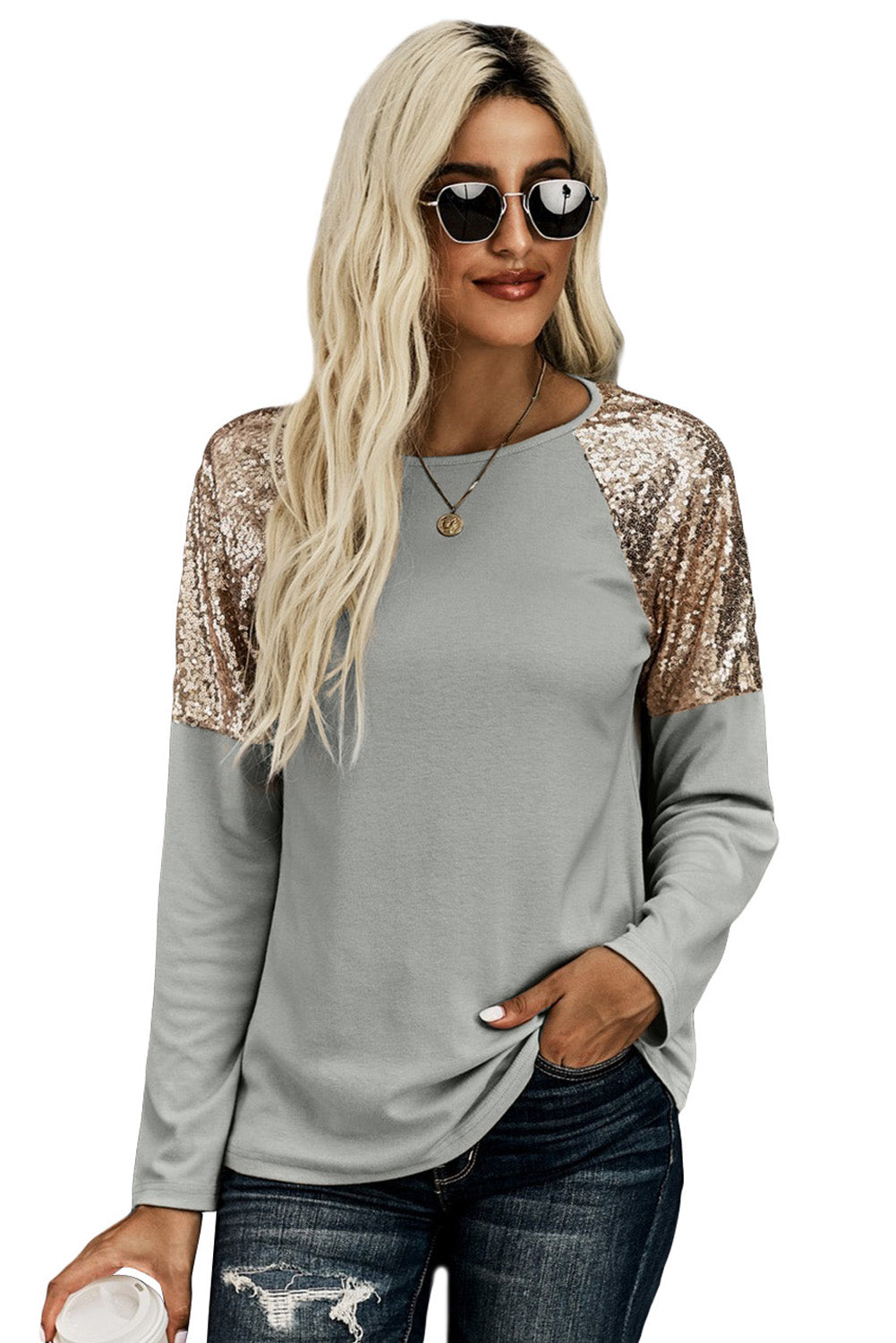 Gray long sleeve top with sequin shoulder detailing, showcasing a classic round neck and soft knit fabric.