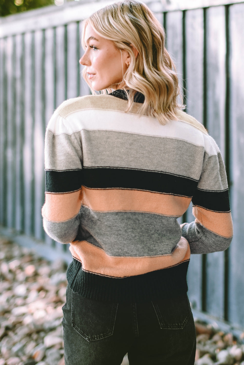 Gray striped color block casual sweater featuring a crew neck and long sleeves, perfect for stylish and comfortable wear.