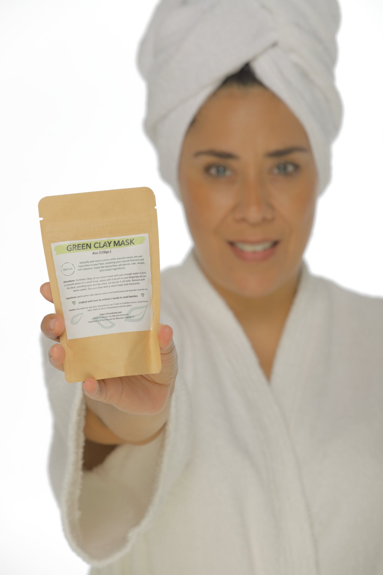 Green Clay Mask in eco-friendly kraft paper packaging, showcasing its natural ingredients and powder form.