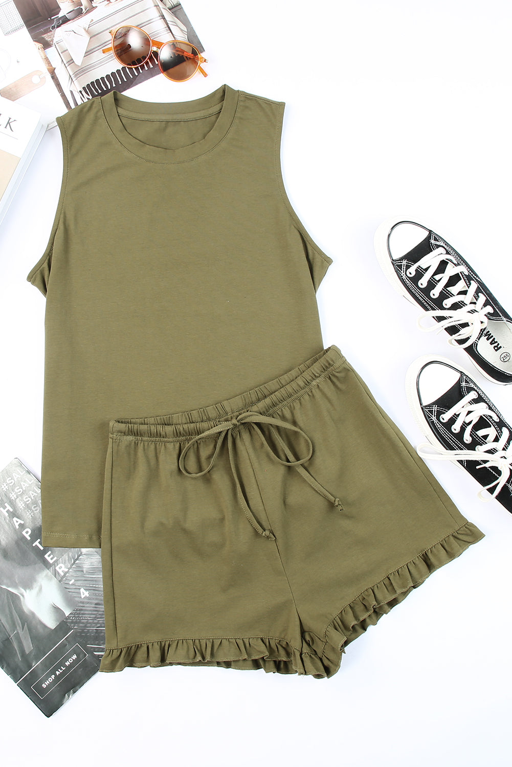 Green crew neck tank top paired with drawstring ruffled shorts, showcasing a stylish and comfortable lounge set for women.