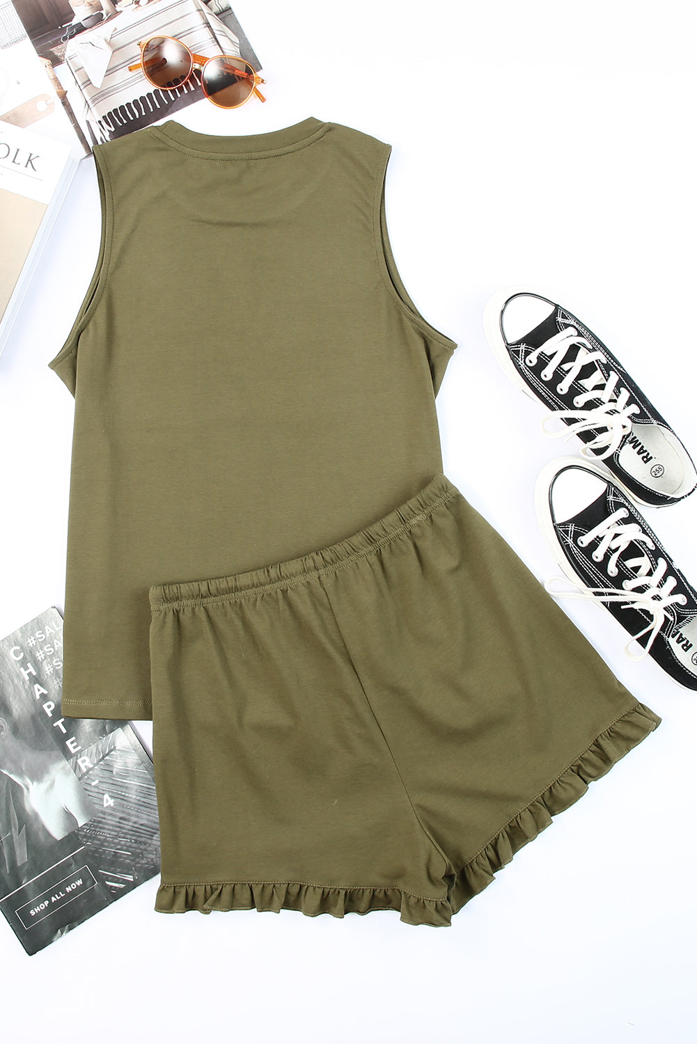 Green crew neck tank top paired with drawstring ruffled shorts, showcasing a stylish and comfortable lounge set for women.