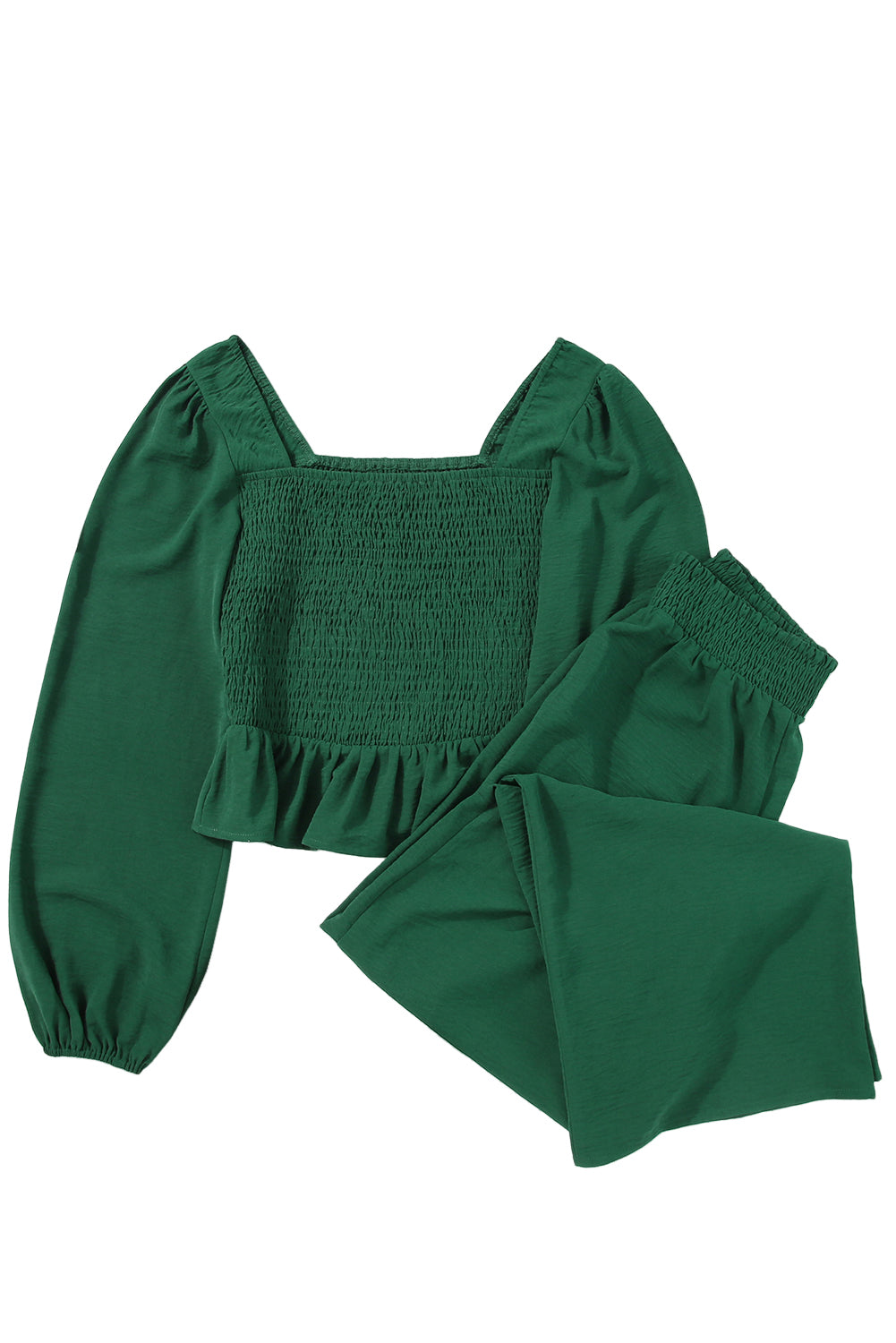 A stylish green square neck smocked peplum top paired with loose high waist pants, showcasing a feminine and elegant look.