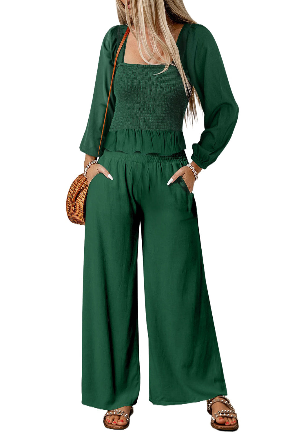 A stylish green square neck smocked peplum top paired with loose high waist pants, showcasing a feminine and elegant look.