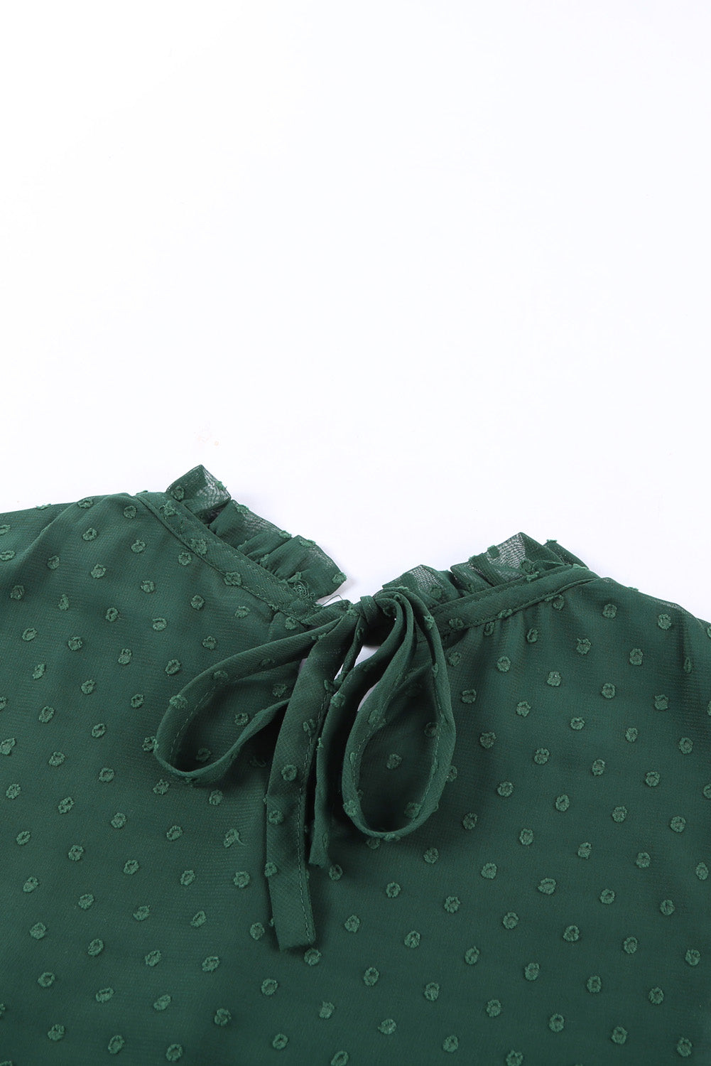 A stylish green tank top featuring Swiss dot and smocked design, with a crew neck and keyhole back, perfect for summer wear.