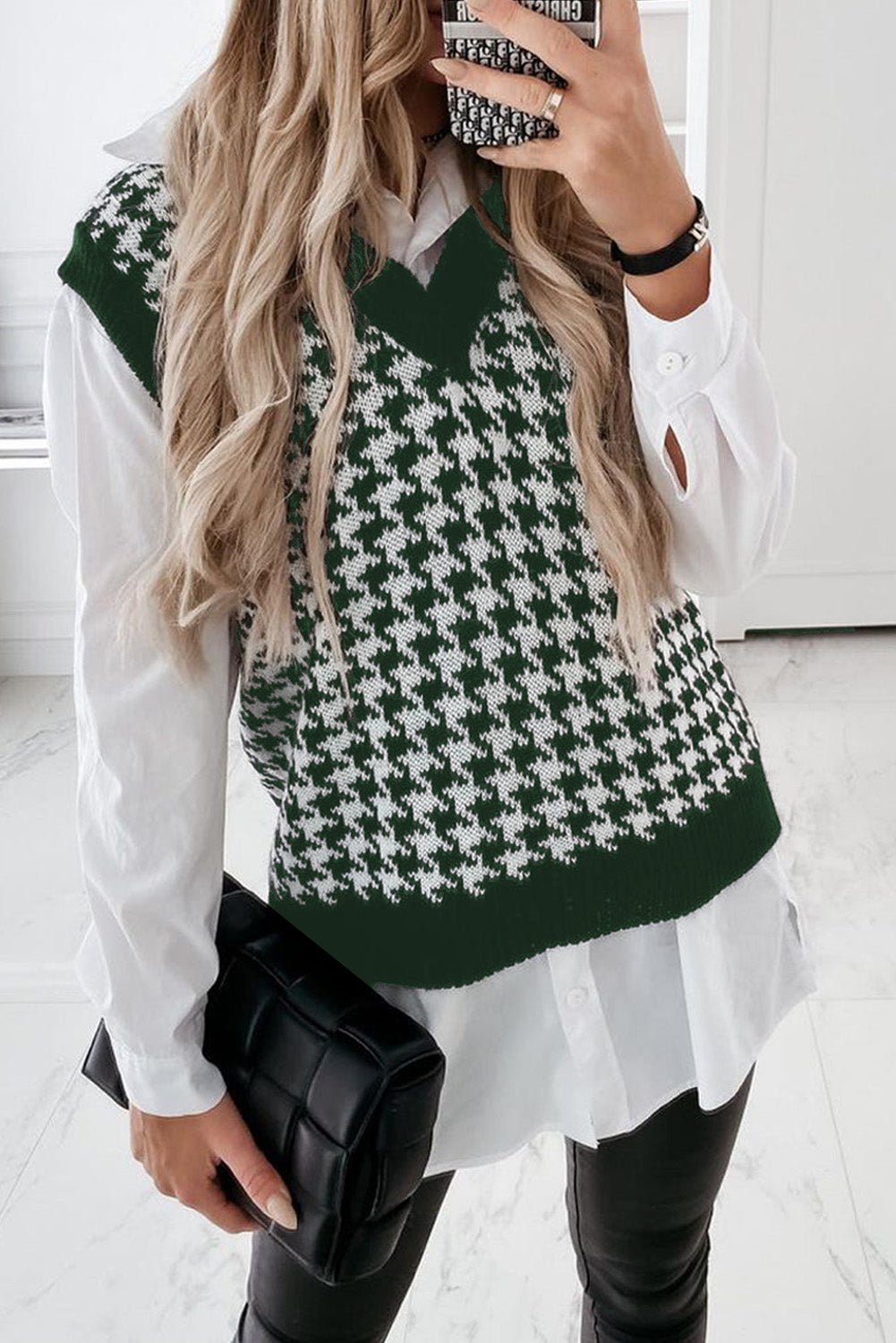 A stylish green V neck argyle plaid knitted sweater vest, showcasing a classic pattern and soft texture, perfect for layering.