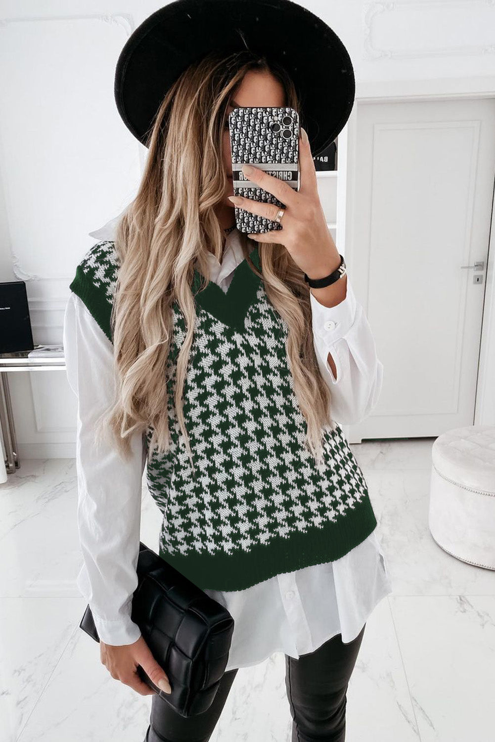 A stylish green V neck argyle plaid knitted sweater vest, showcasing a classic pattern and soft texture, perfect for layering.