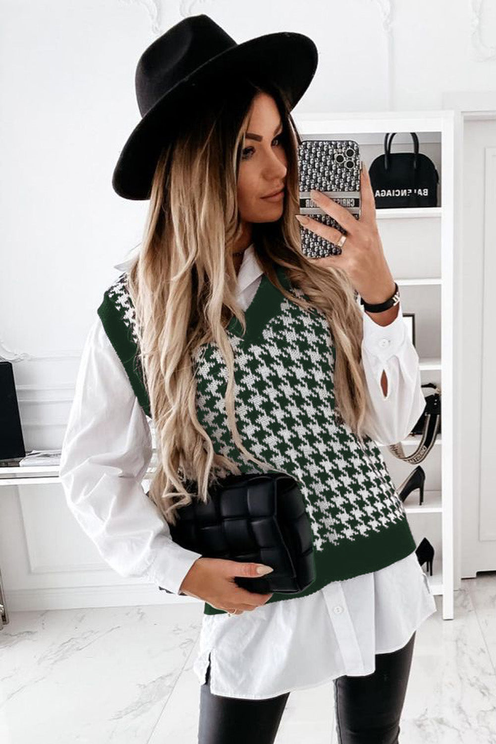 A stylish green V neck argyle plaid knitted sweater vest, showcasing a classic pattern and soft texture, perfect for layering.