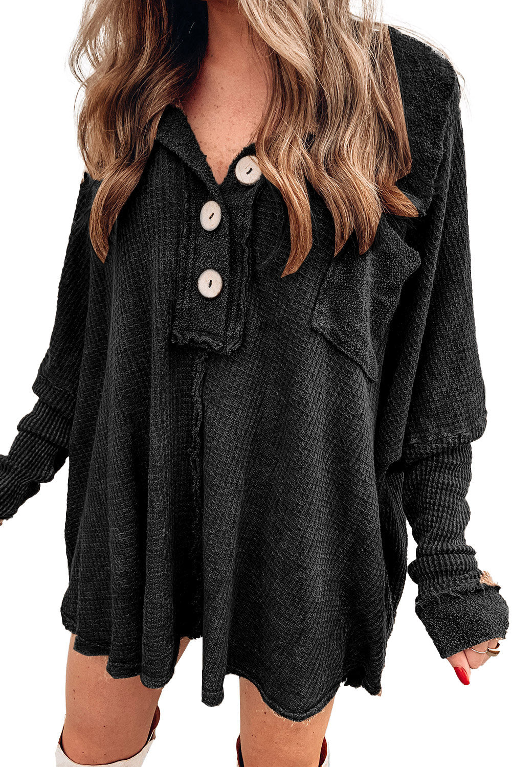 A stylish green waffle knit long sleeve top with buttons, perfect for casual wear and layering.