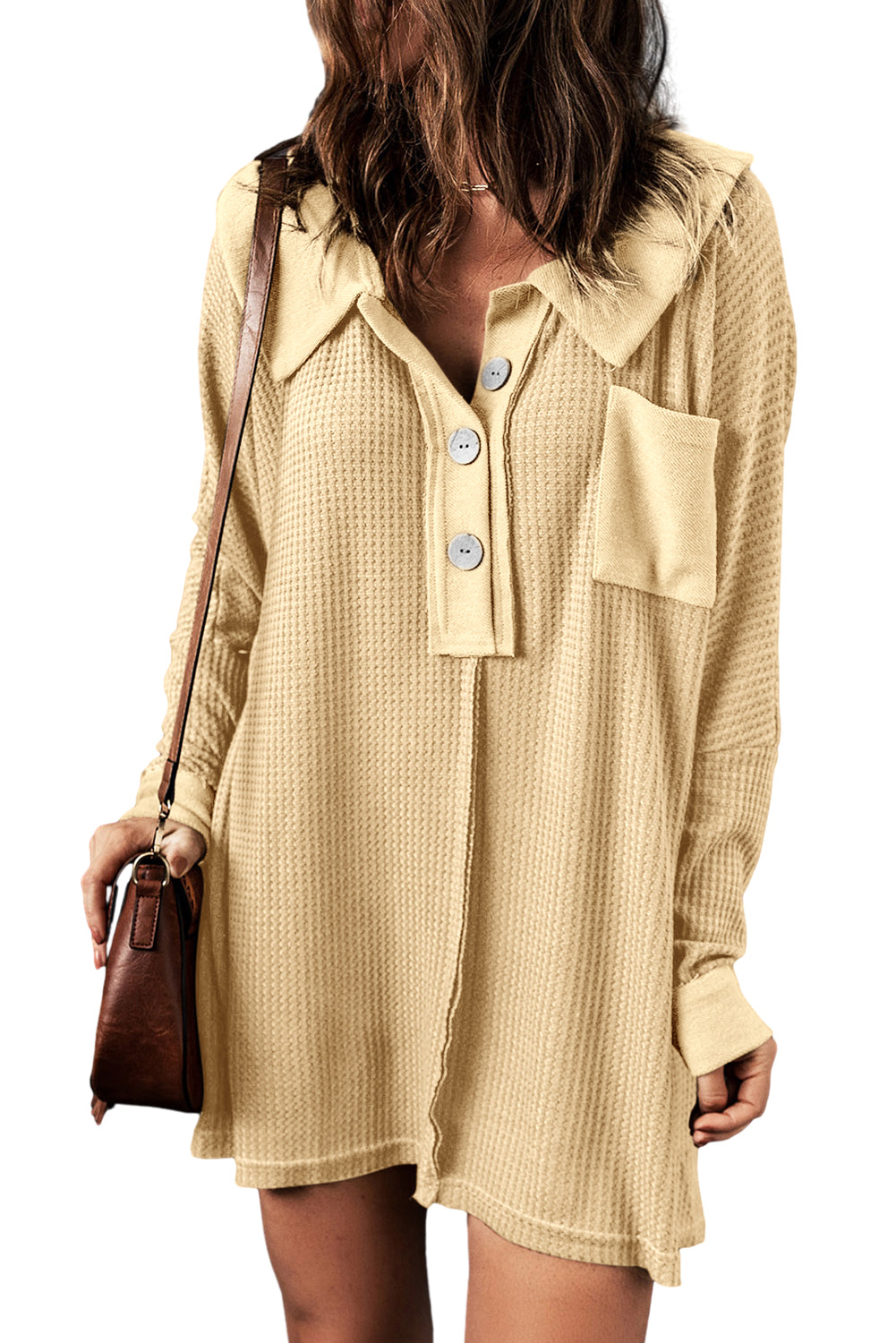 A stylish green waffle knit long sleeve top with buttons, perfect for casual wear and layering.