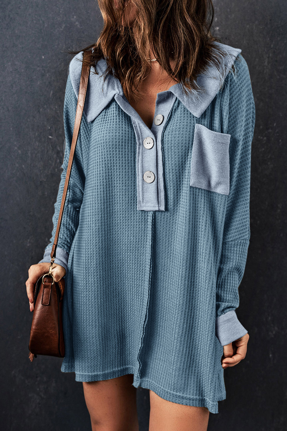 A stylish green waffle knit long sleeve top with buttons, perfect for casual wear and layering.