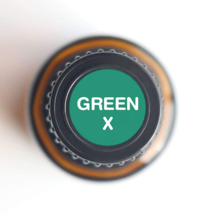 Green-X Oral Health Essential Oil in a 15-ml bottle, featuring a blend of natural essential oils for skin and lip health.