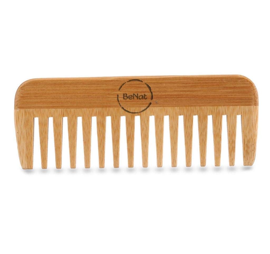 Hair Care Bundle featuring shampoo bar, conditioner bar, bamboo comb, wooden brush, and scalp massager arranged aesthetically.