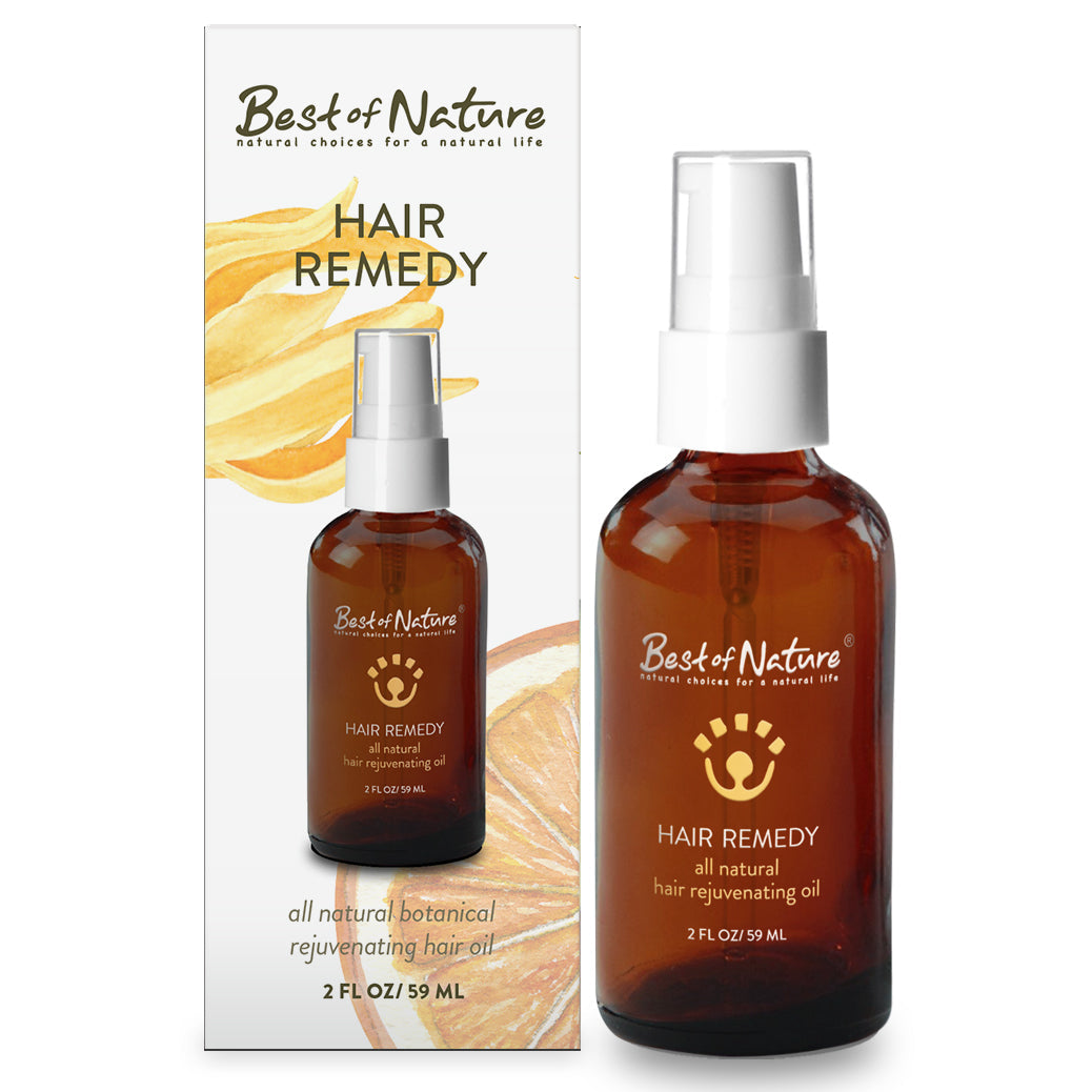 A 2 oz bottle of Hair Remedy Oil with a pump top, featuring a blend of natural oils for healthy, shiny hair.