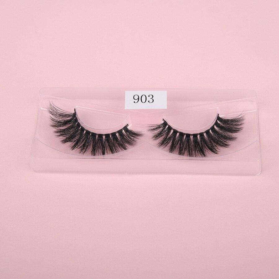 A pair of luxurious HandMade Mink Eyelashes showcasing 3D natural false lashes with a black cotton band, perfect for enhancing eye makeup.