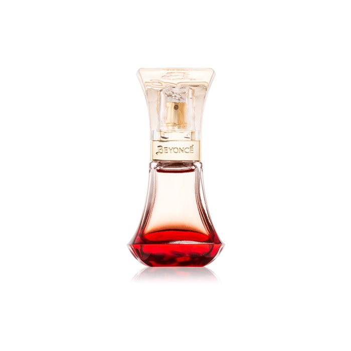 Beyoncé Heat Eau de Parfum bottle with a sleek red design, symbolizing seduction and femininity.