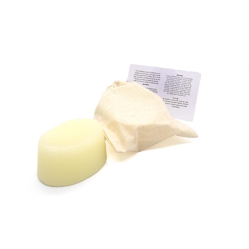 Herbalicious Organic Conditioner Bar with natural ingredients for hair care, featuring cocoa, argan, and shea oils.