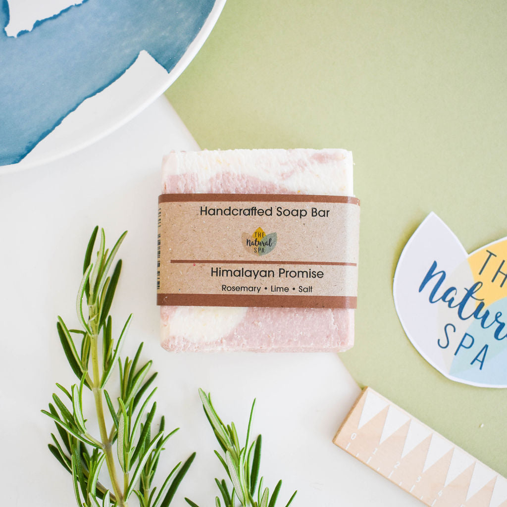 Himalayan Promise Soap Bar featuring rosemary and lime scent, enriched with Himalayan pink salt, showcasing a unique handmade design.