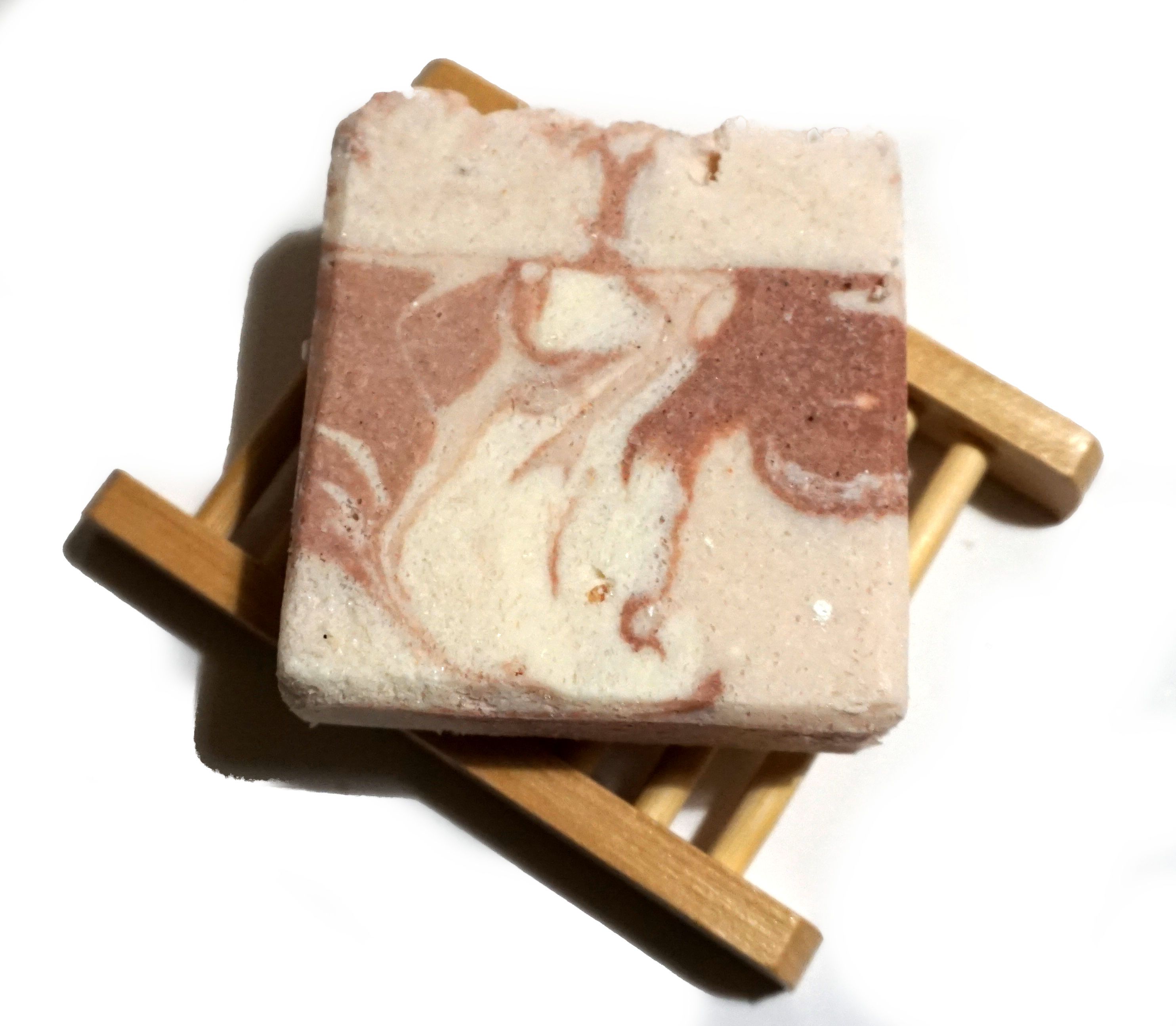 Himalayan Promise Soap Bar featuring rosemary and lime scent, enriched with Himalayan pink salt, showcasing a unique handmade design.