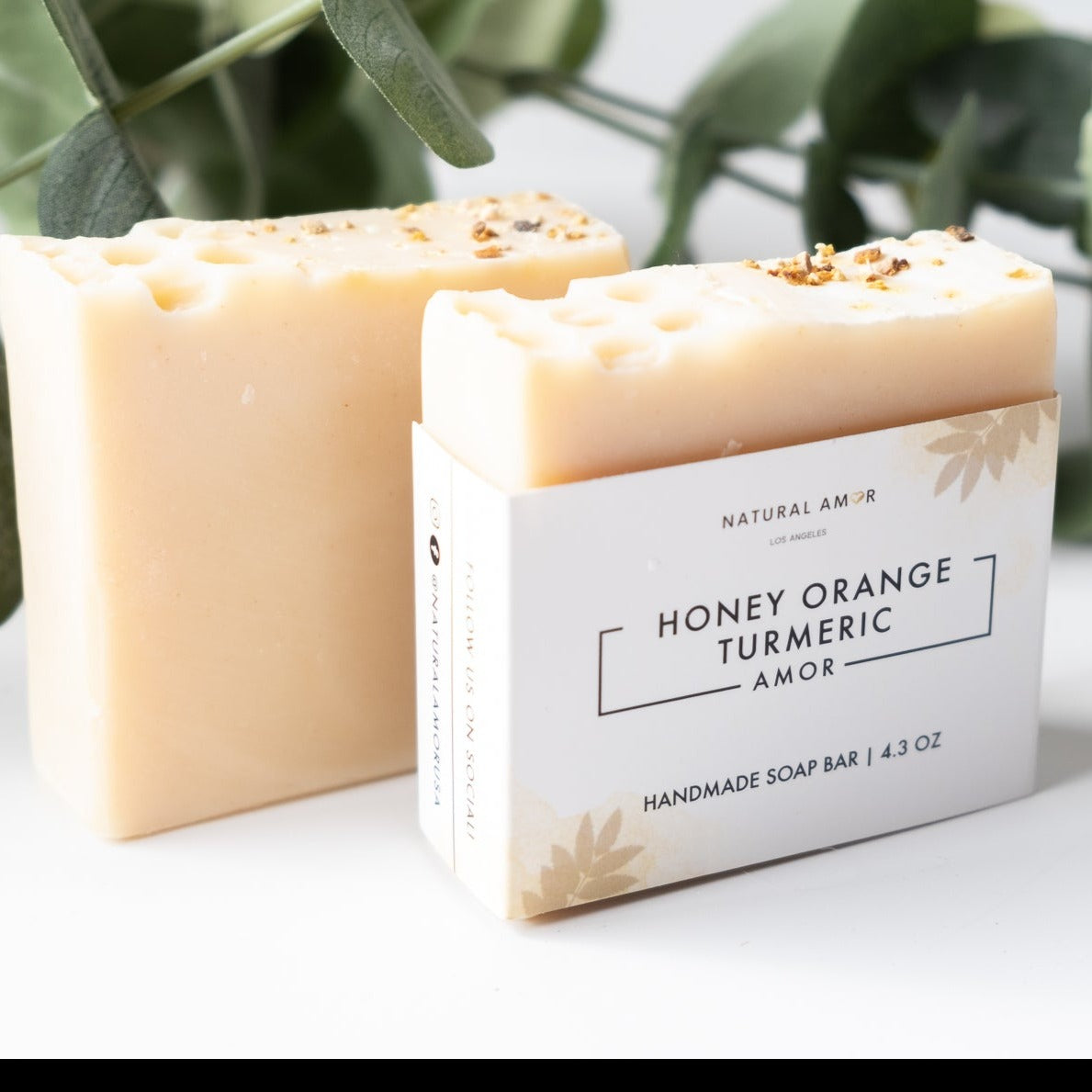 Honey Orange Turmeric Soap Bar with natural ingredients, showcasing its creamy texture and vibrant color.