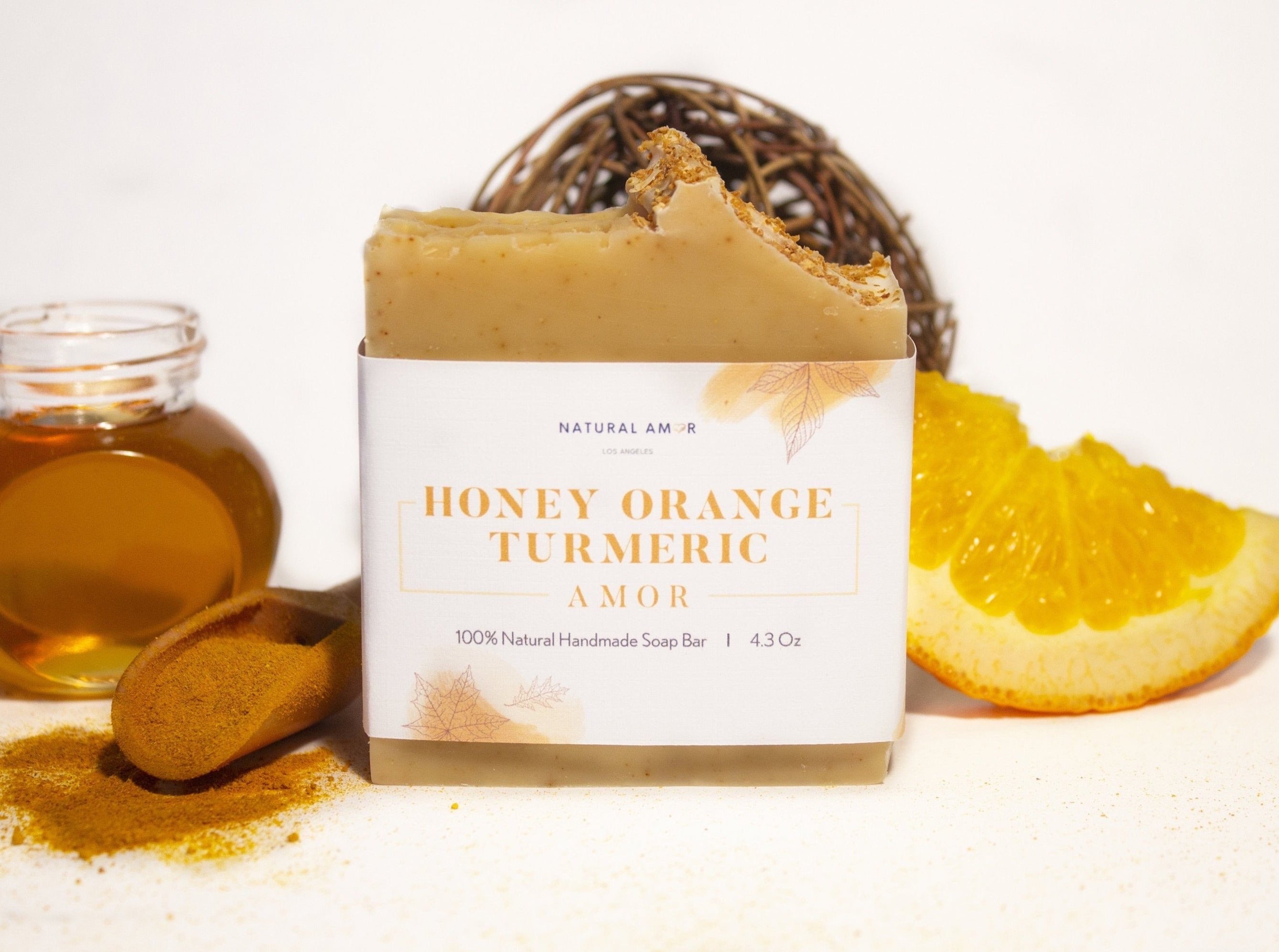 Honey Orange Turmeric Soap Bar with natural ingredients, showcasing its creamy texture and vibrant color.