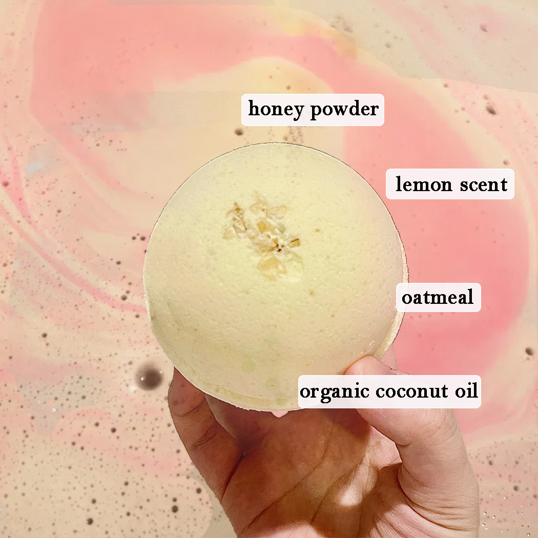 Honeybee Lemon Bath Bomb, 8oz, featuring a vibrant yellow color with a honeycomb texture, perfect for a relaxing bath experience.