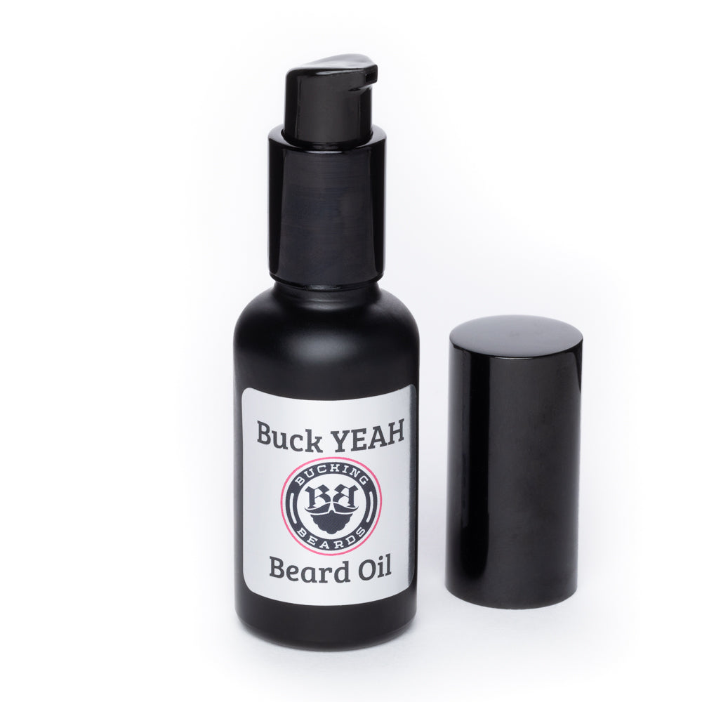 Bucking Beards Hydrating Beard Oil bottle with a wooden background, showcasing its natural ingredients and elegant design.