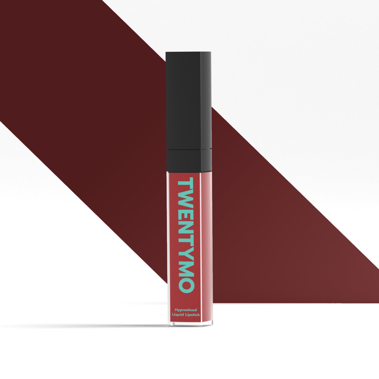 Hypnotised high-coverage liquid lipstick in a sleek tube, showcasing its vibrant color and creamy texture.