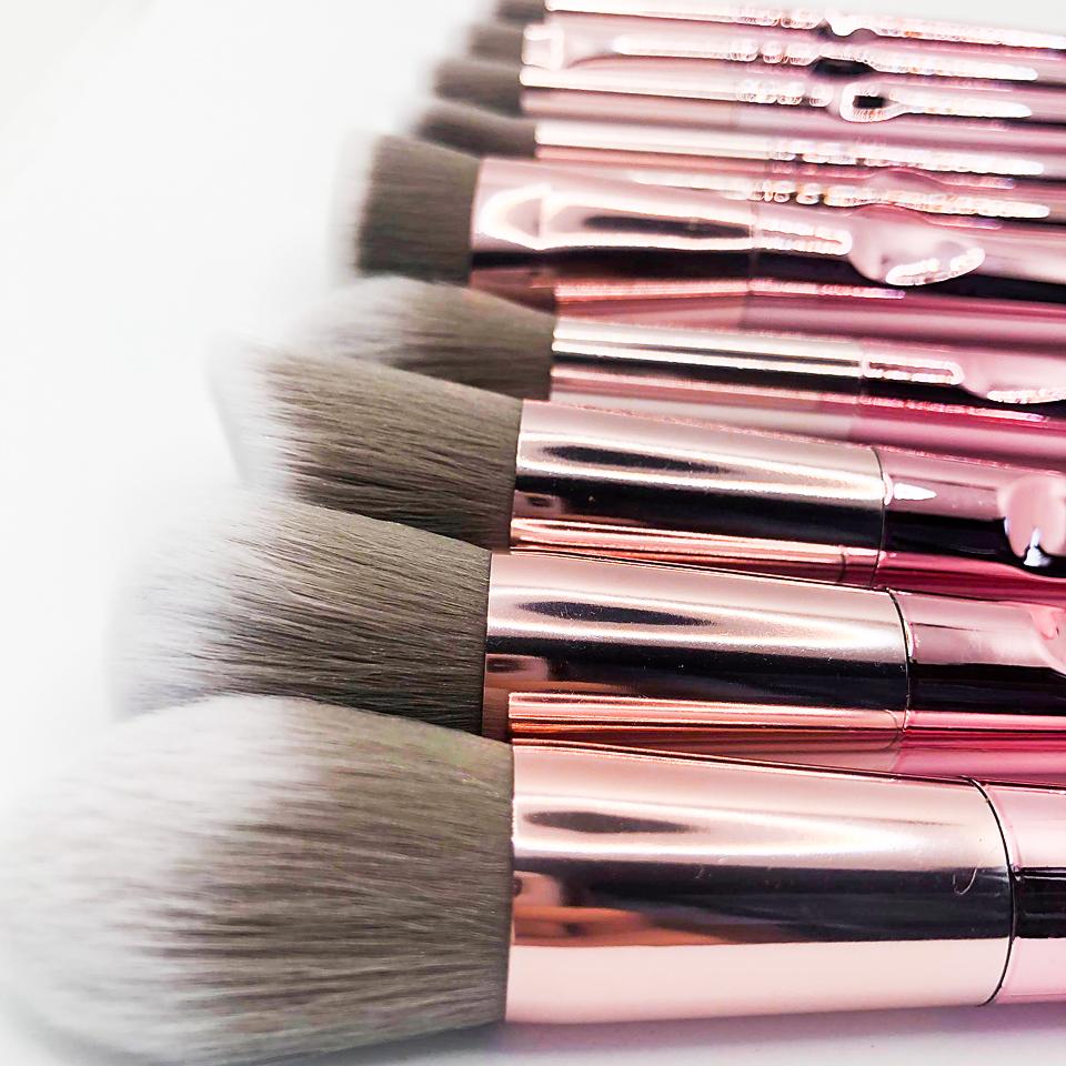 I Am Light Brush Collection featuring 10 rose gold brushes, a stylish carrying case, and a heart-shaped mirror.