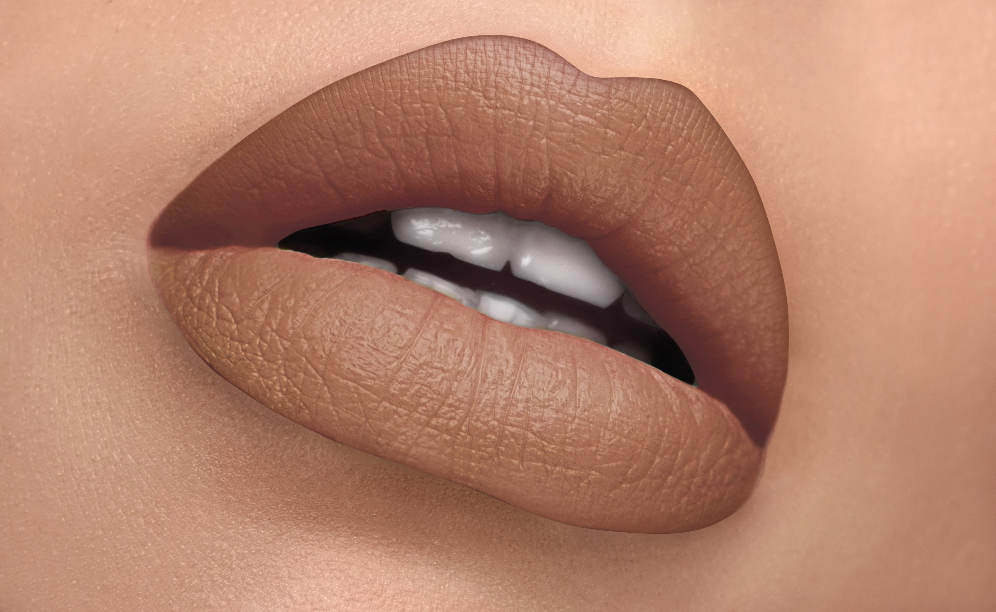 Immortal Silk-Matte Lipstick in Neutral Nude shade, showcasing its elegant packaging and rich color.