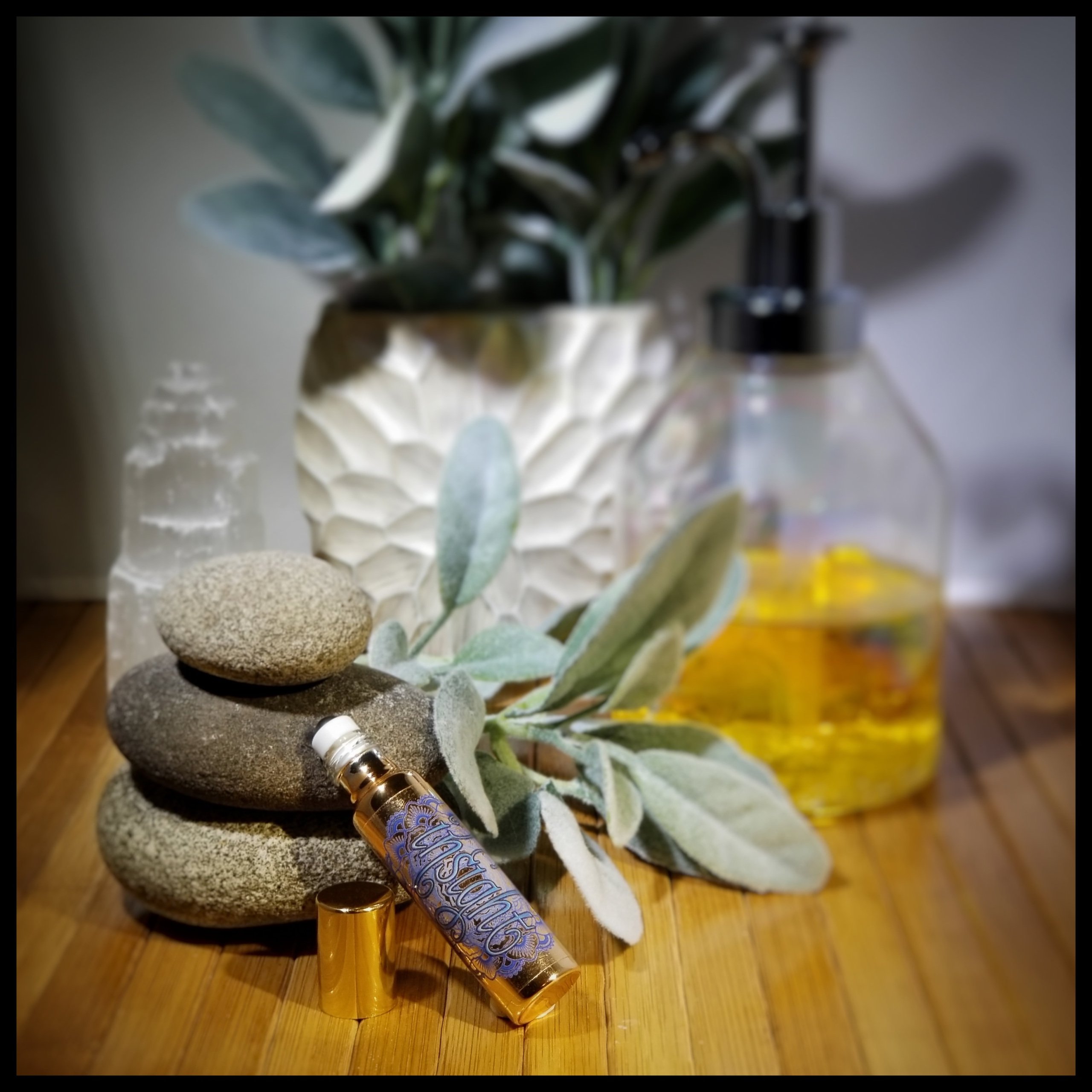 Insight Essential Oil Roll On in a stylish metallic glass bottle, designed for enhancing intuition and spiritual insight.