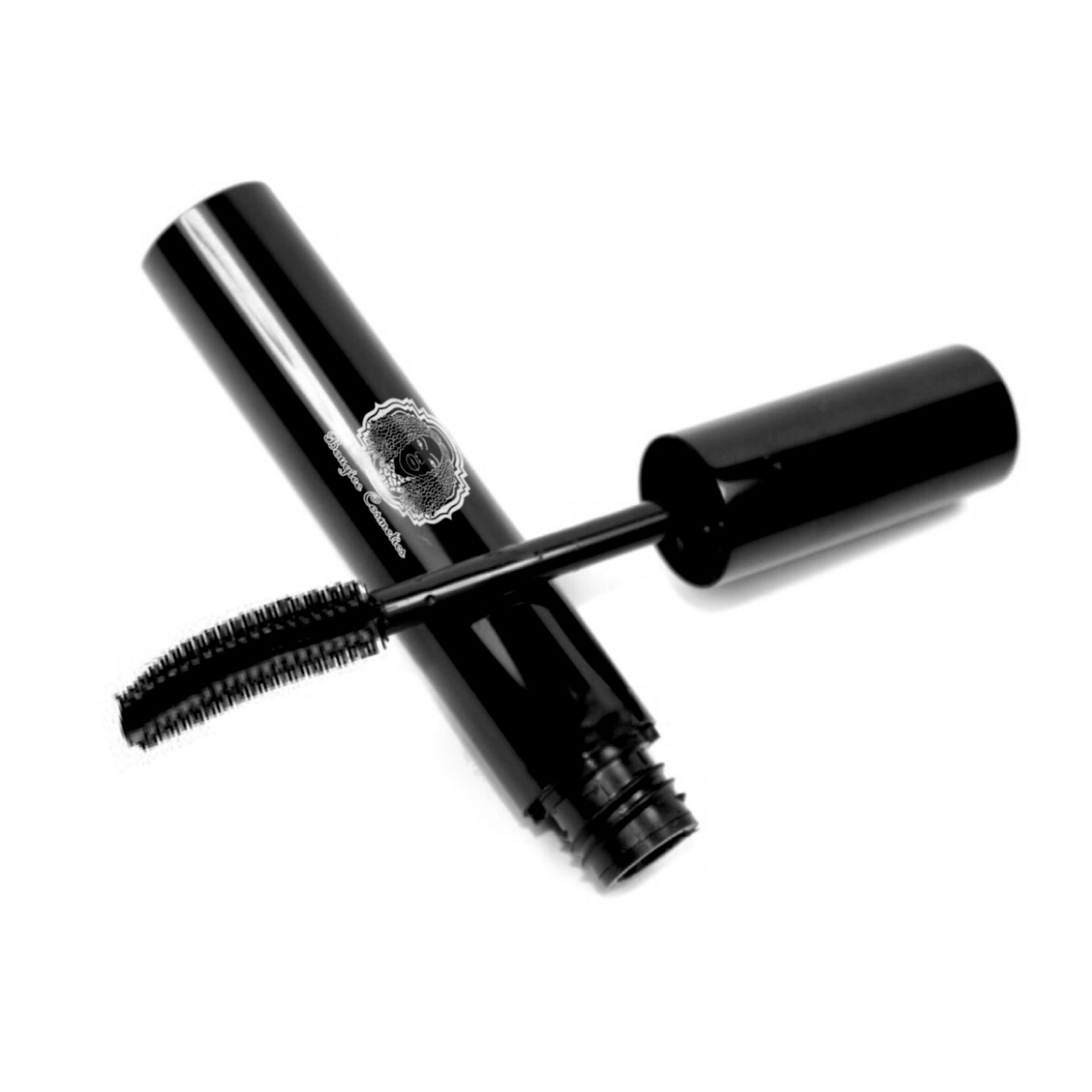 A sleek tube of Intense Lash Mascara Black with a brush applicator, showcasing its water-resistant formula and intense pigmentation for curling and lengthening lashes.