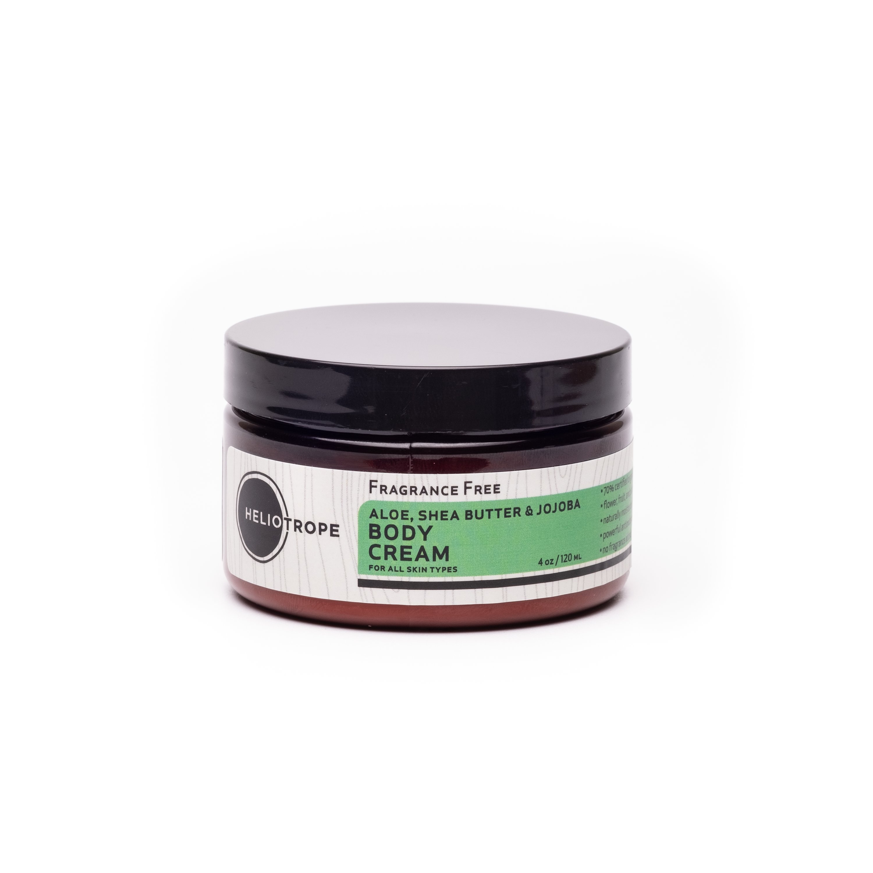 A jar of Jojoba & Avocado Body Balm showcasing its thick, creamy texture and organic ingredients.