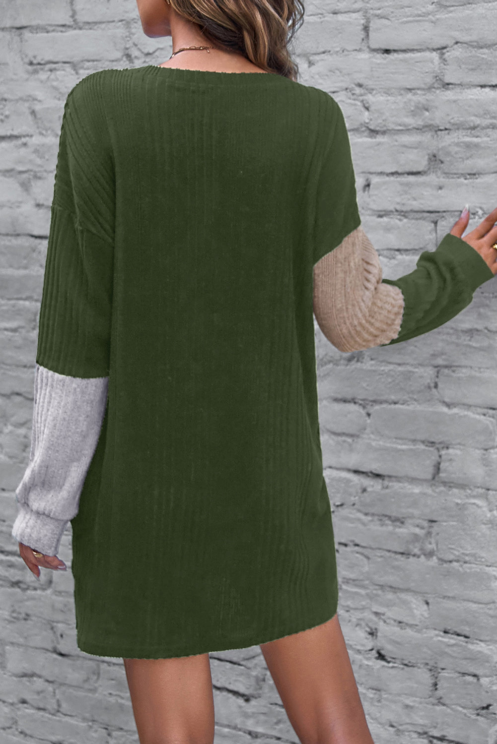 Jungle Green Ribbed Color Block Drop Shoulder Long Sleeve Mini Dress displayed on a mannequin, showcasing its trendy design and ribbed texture.