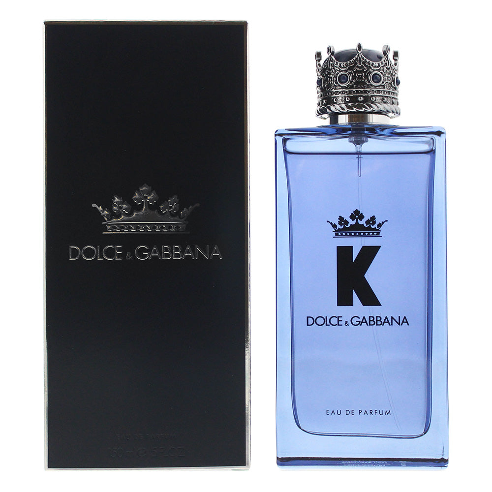 K Eau de Parfum by Dolce & Gabbana in a sleek blue bottle with a crown cap, symbolizing confidence and sophistication.