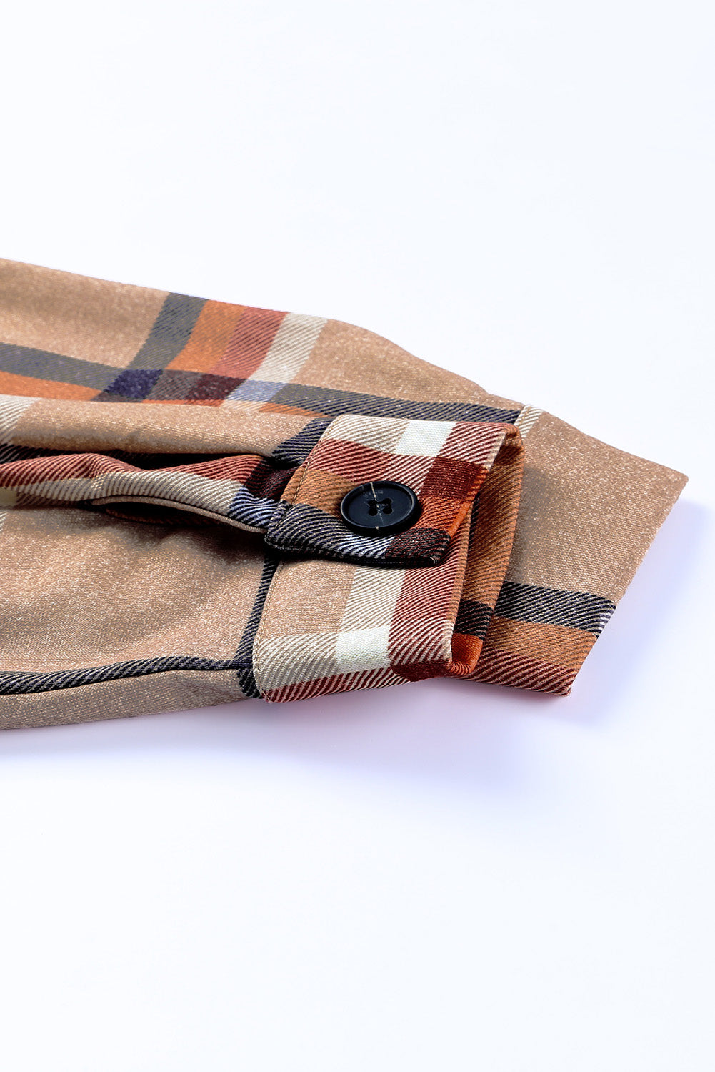 Khaki oversized plaid shacket with button closure and chest pockets, perfect for layering.