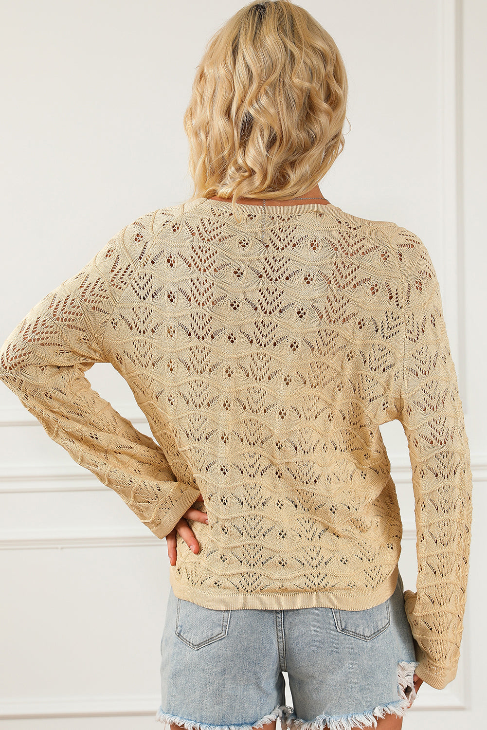 Khaki Hollowed Knit Asymmetric Drawstring Sweater showcasing a trendy hollowed knit design with drawstring accents and an asymmetric neckline.