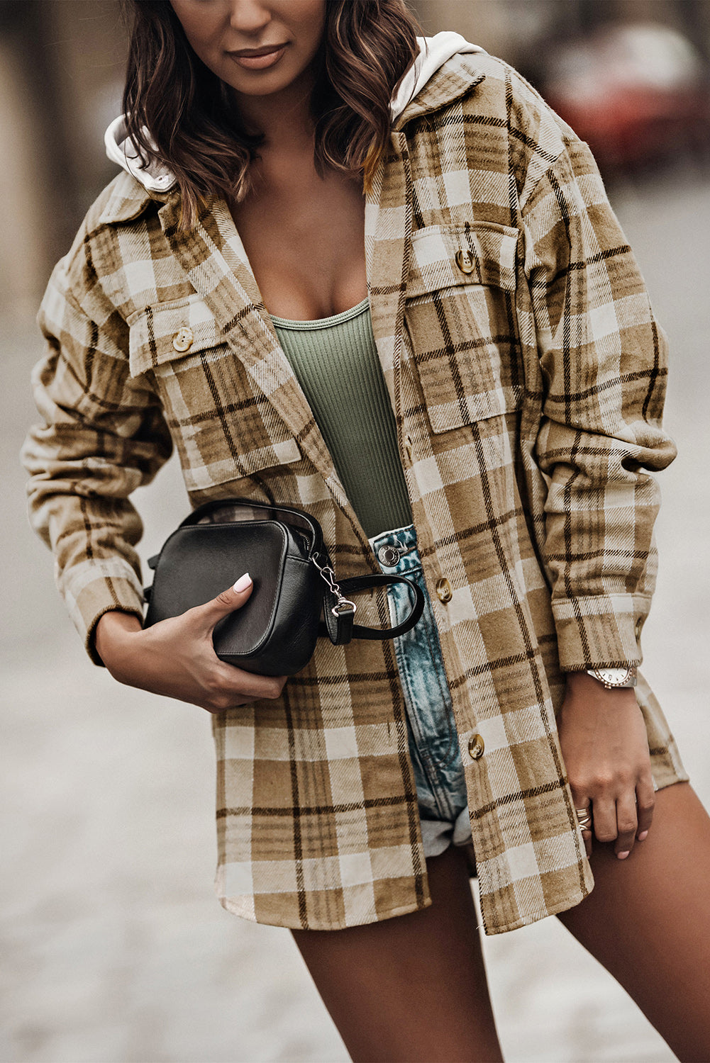 Khaki plaid shirt hooded jacket with flap pockets and buttons, perfect for chilly weather.