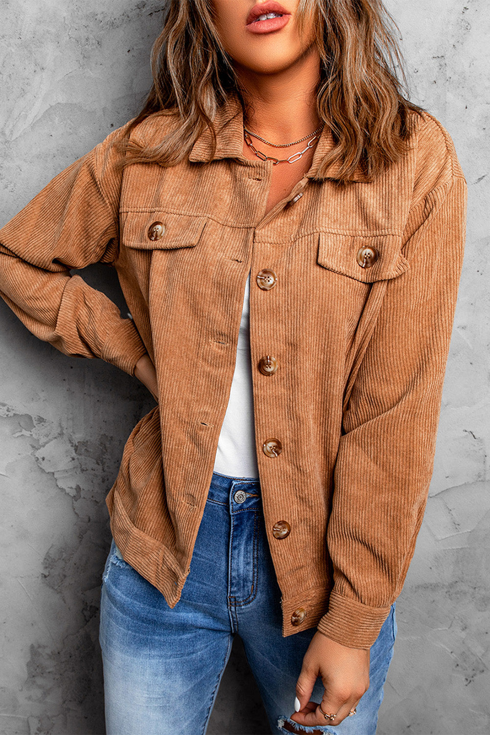 Khaki ribbed corduroy long sleeve jacket featuring a turn-down collar and multiple pockets, perfect for autumn wear.