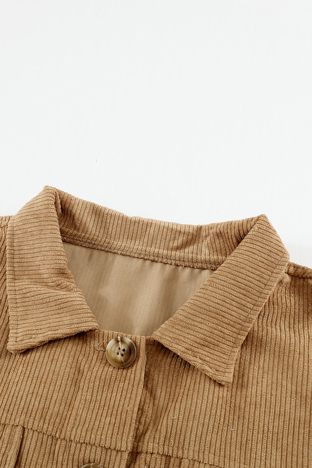 Khaki ribbed corduroy long sleeve jacket featuring a turn-down collar and multiple pockets, perfect for autumn wear.