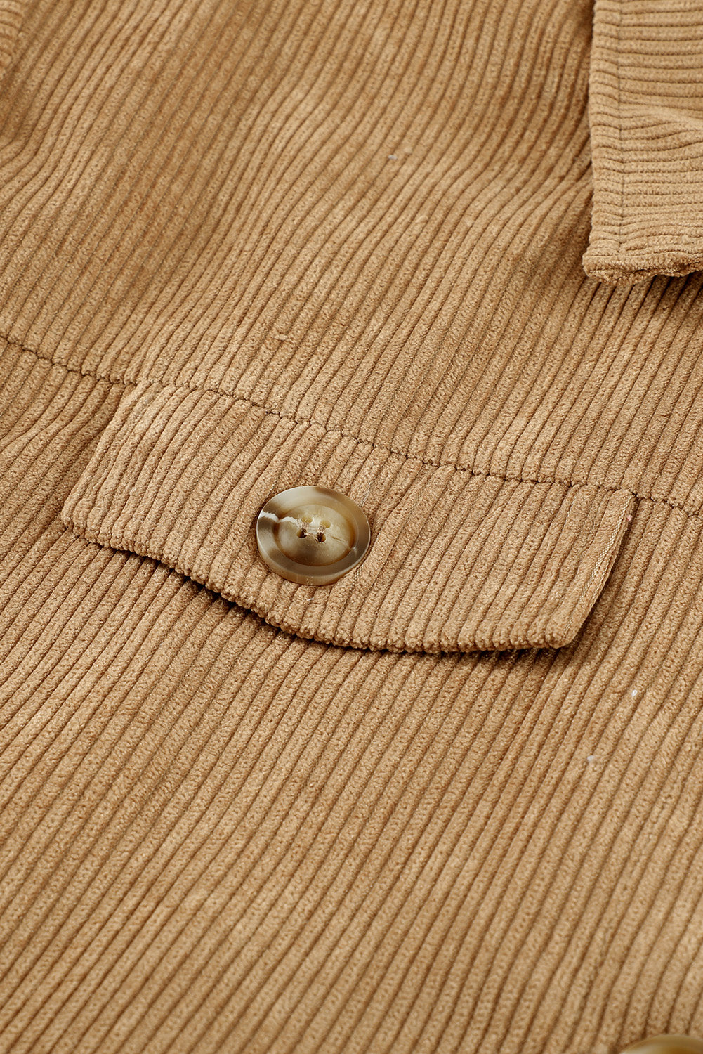 Khaki ribbed corduroy long sleeve jacket featuring a turn-down collar and multiple pockets, perfect for autumn wear.