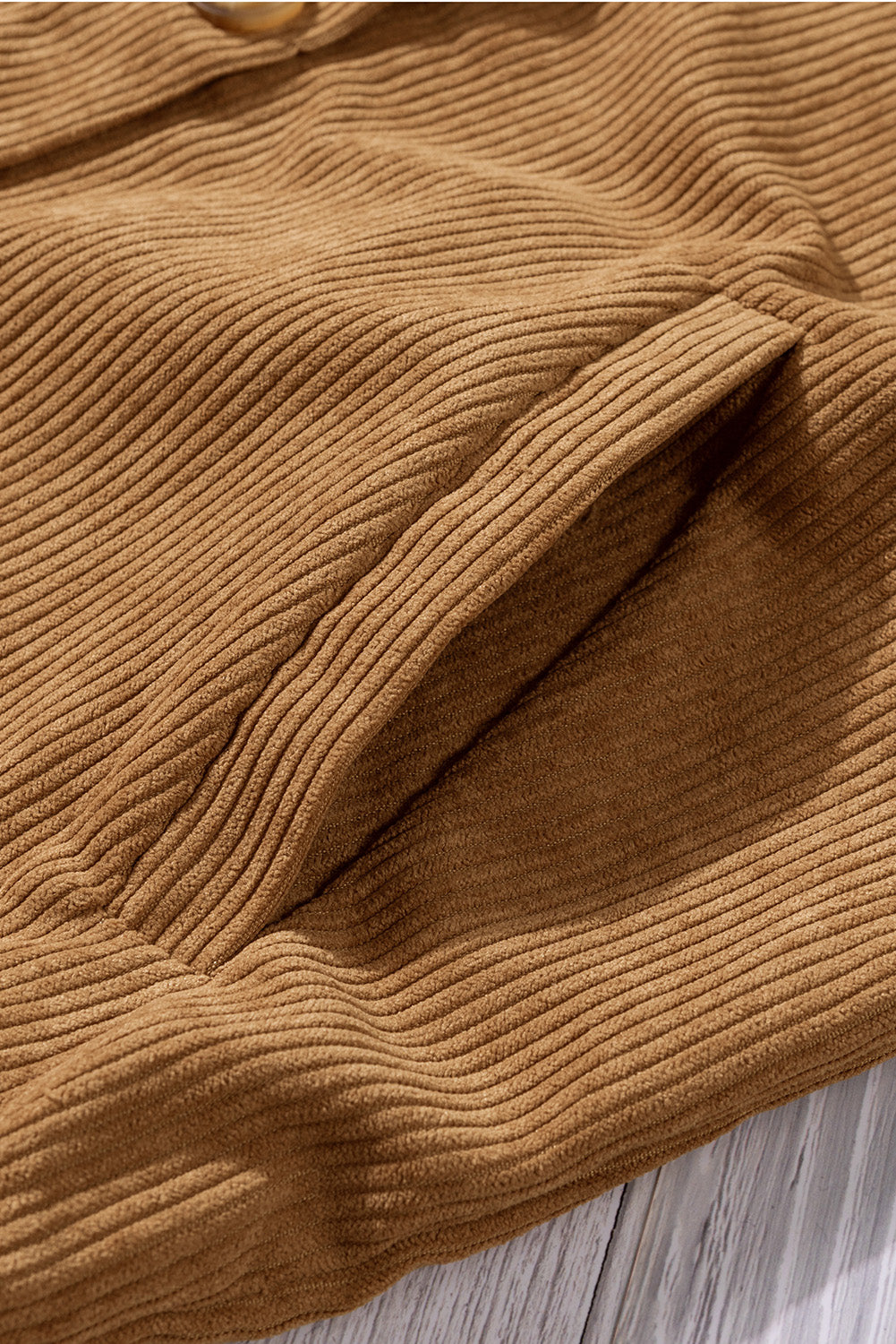 Khaki ribbed corduroy long sleeve jacket featuring a turn-down collar and multiple pockets, perfect for autumn wear.