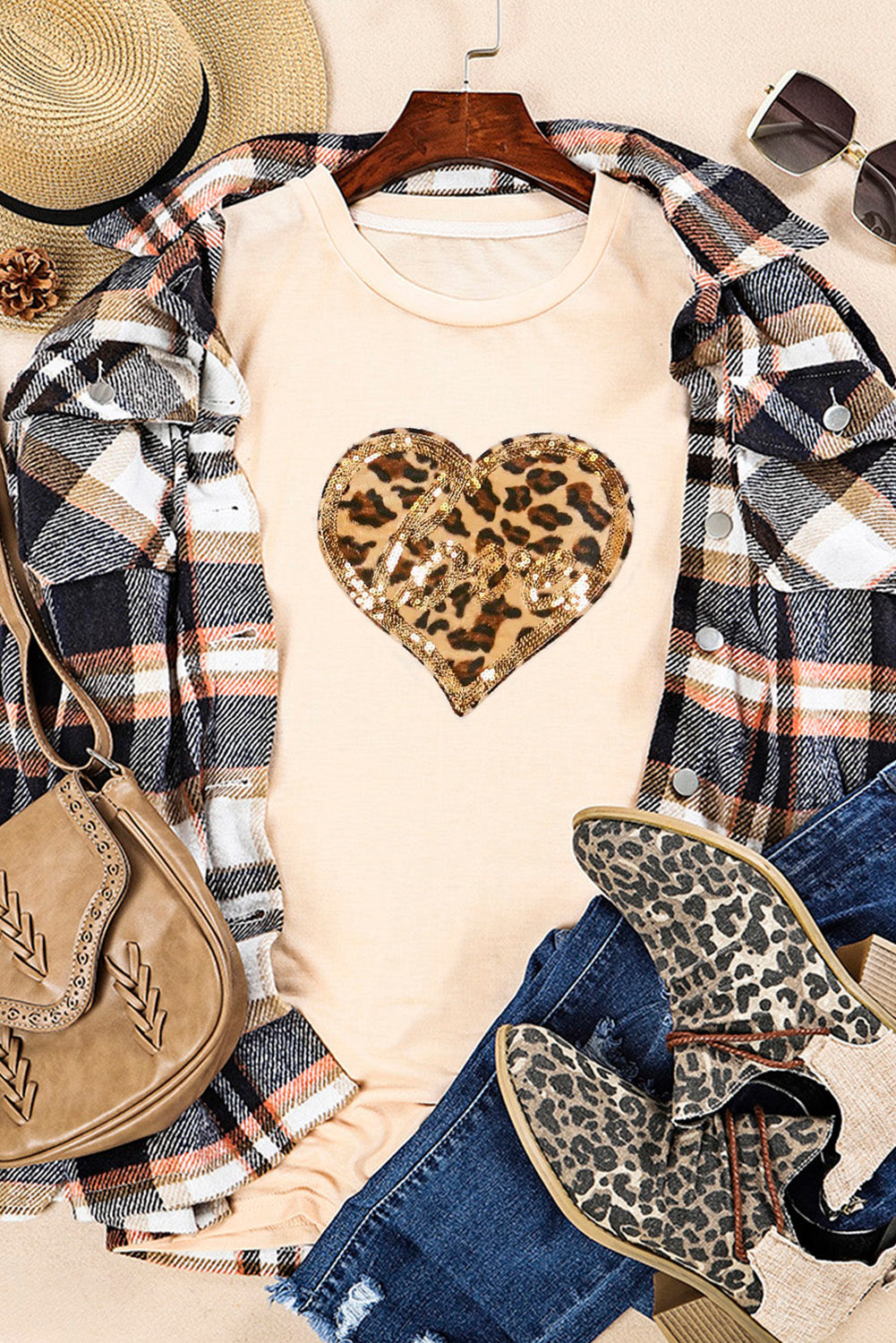 Khaki T-shirt featuring a sequined leopard print heart design, perfect for Valentine's Day fashion.