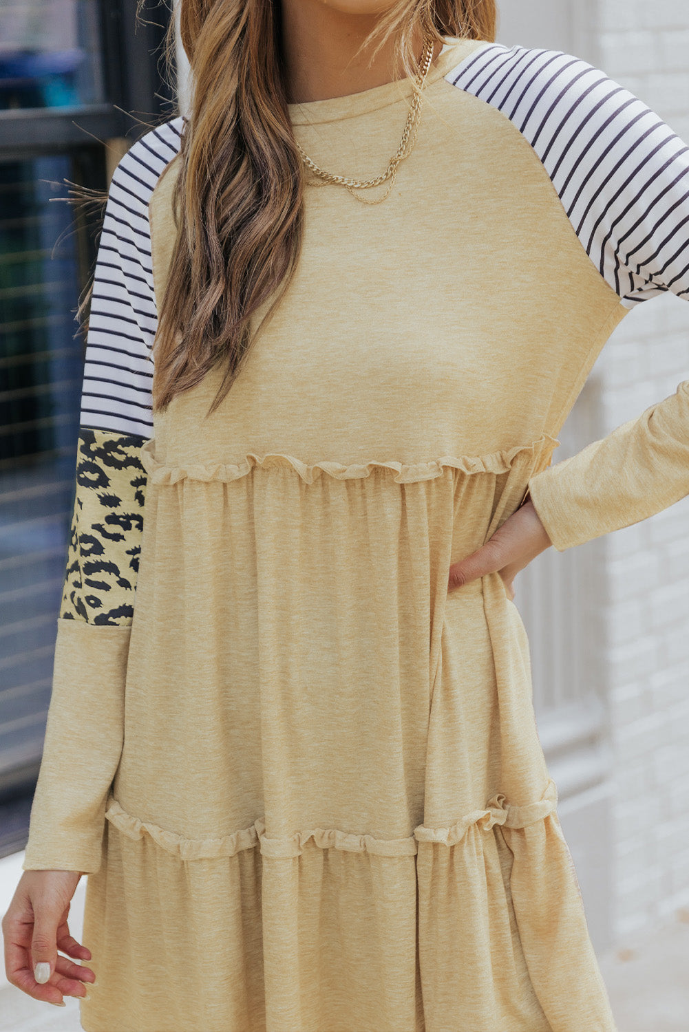 Khaki striped leopard patchwork long sleeve mini dress featuring a round neck, raglan sleeves, and a tiered frilled design.