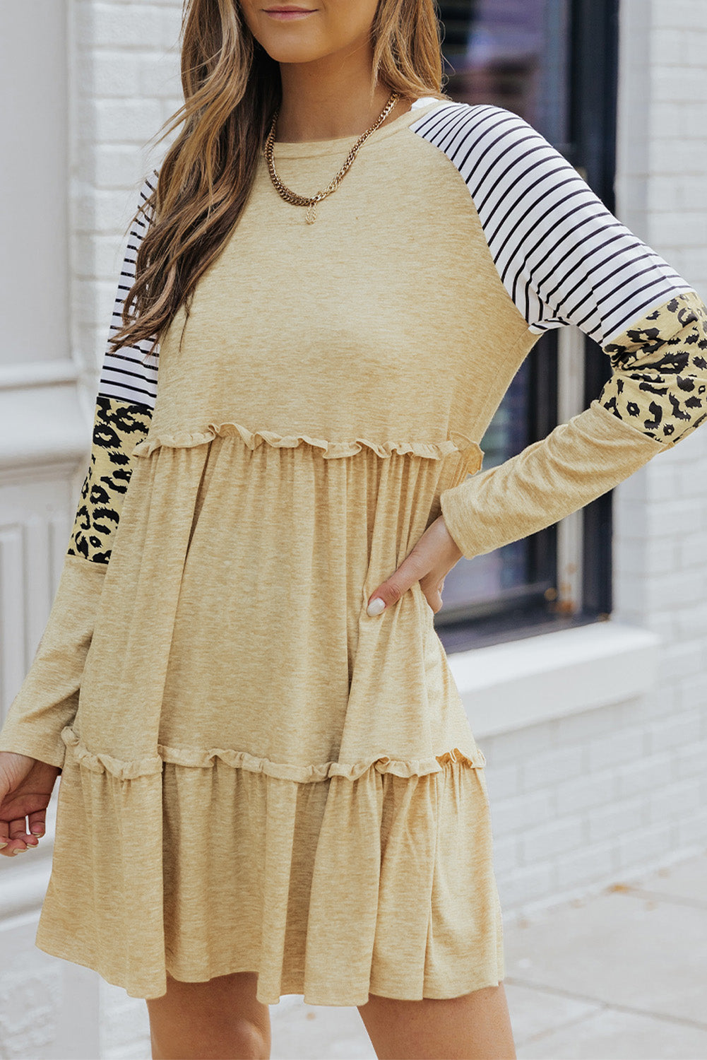 Khaki striped leopard patchwork long sleeve mini dress featuring a round neck, raglan sleeves, and a tiered frilled design.