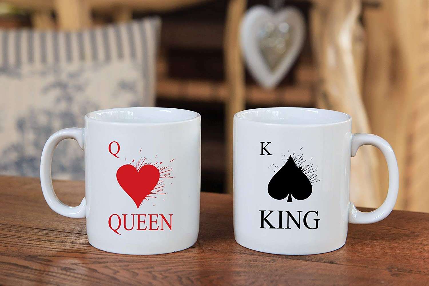 A beautifully designed King and Queen Mugs Set featuring elegant motifs, perfect for couples.