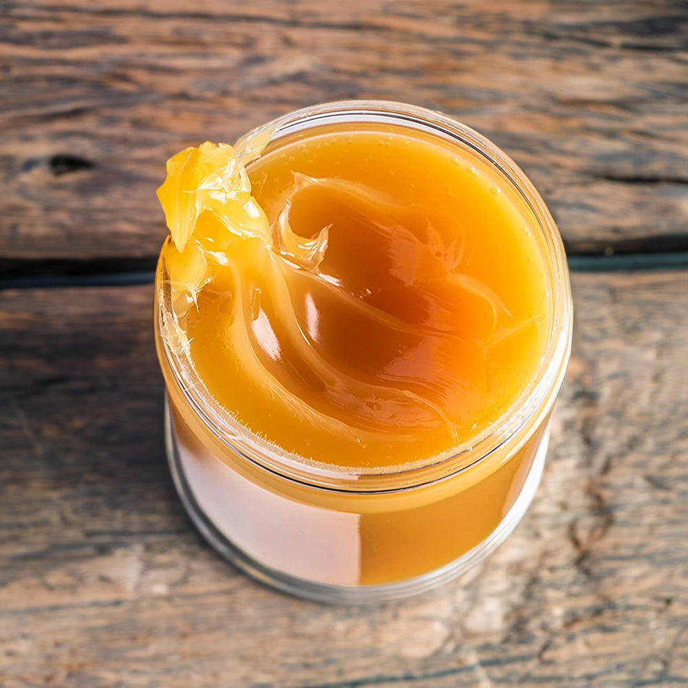 A jar of pure lanolin butter, creamy and rich, ideal for moisturizing dry skin.