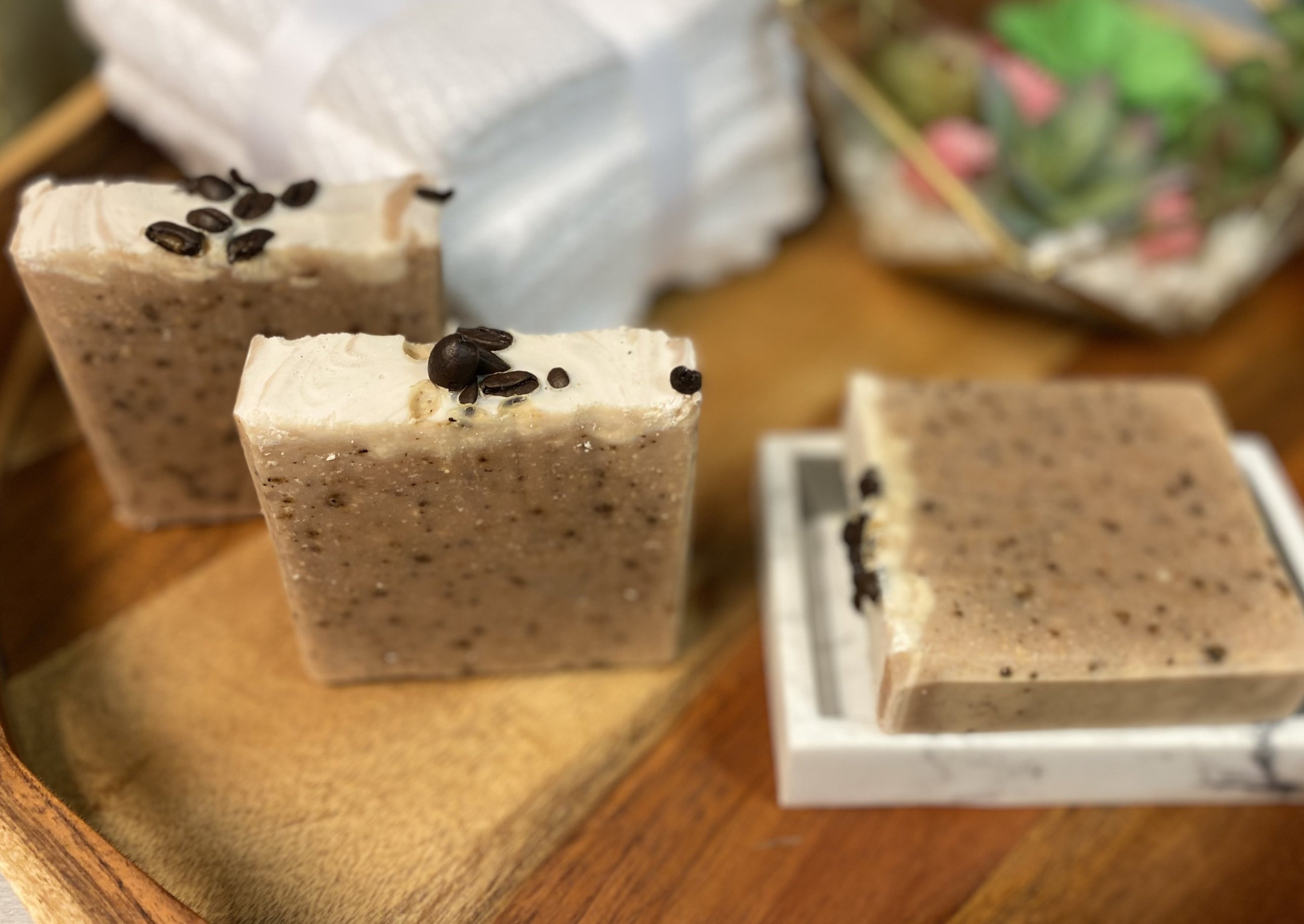 Large Goats Milk Coffee Scrub Soap bar with coffee grounds and oatmeal, showcasing its creamy texture and caramel color.